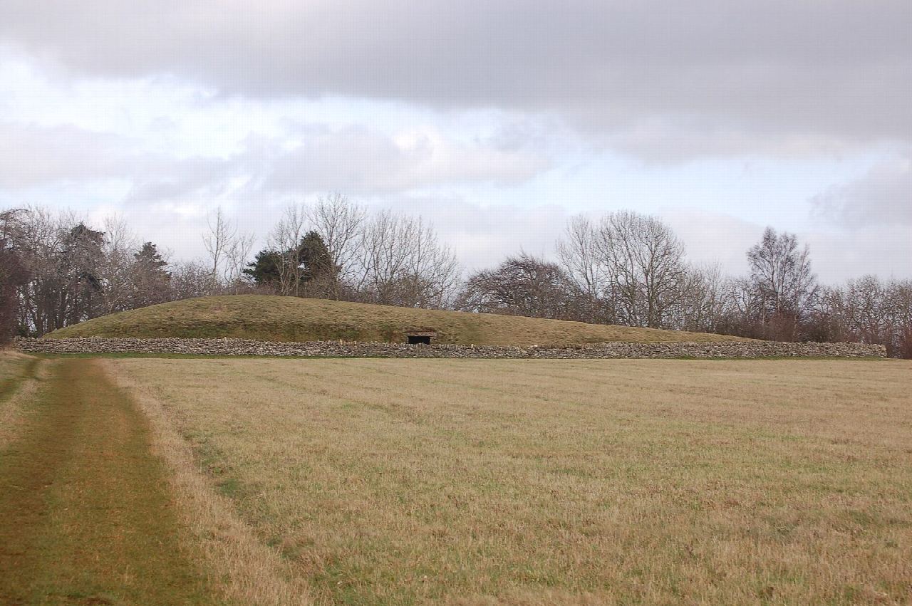 Belas Knap long barrow and the Cotswold Way from Corndean Lane
